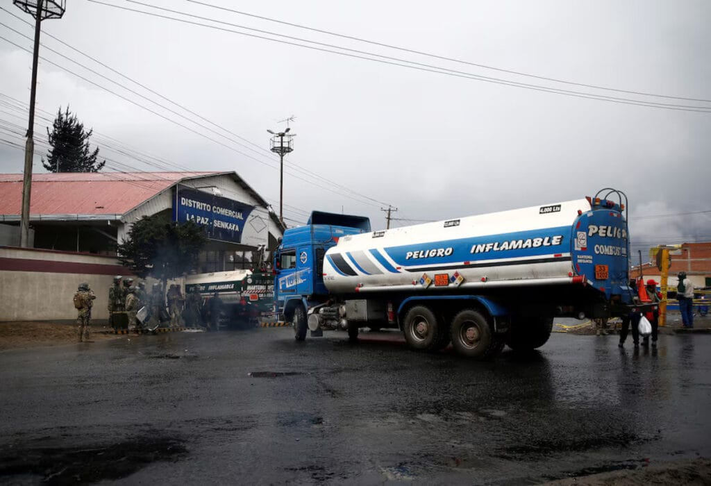 Image of fuel imports in Bolivia, showing trucks transporting gasoline and diesel as part of new government incentives to address fuel shortages.