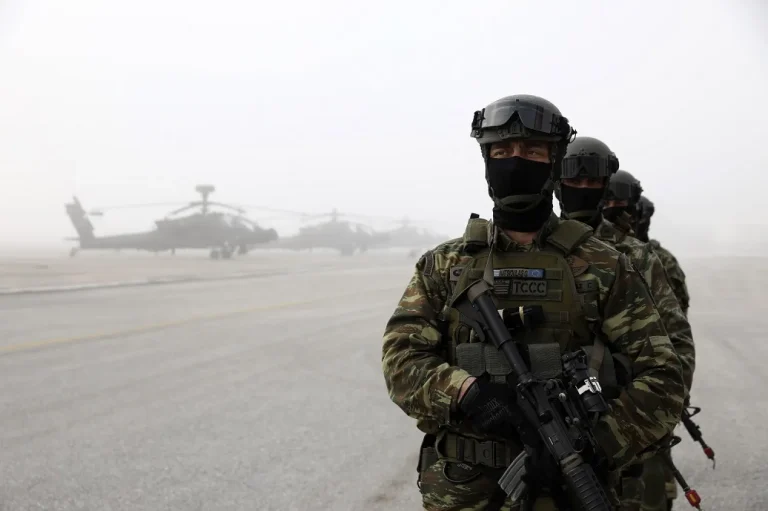 greek marines stand near helicopters during a drill at a military base in stefanovikio central greece on wednesday feb. 19 2020. ap.jpg