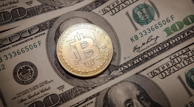 Bitcoin token on a dollar note id 17db7d6d 1a30 44ea b695 54bdf1f87c6c size9001