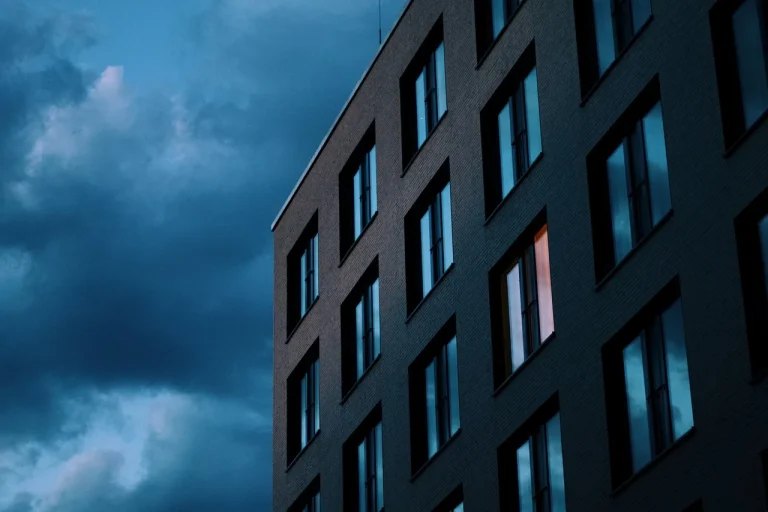 house against blue backdrop.png